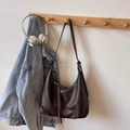 Retro dark brown hobo bag with sleek leather shoulder strap and long tassel detail - Coffee No Charm
