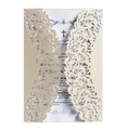 Detail of laser cut champagne gold lace wedding invitation with pearlized texture - Ivory