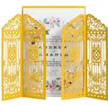 Macro detail of laser-cut gold wedding invitation cover with floral inner card - Gold