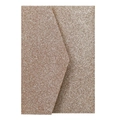 Macro detail of rose gold glitter envelope with sparkling texture and V-flap design - Rose Gold