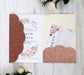 Detail of rose gold glitter laser-cut wedding invitation with elegant floral inserts - Apple Gold