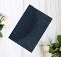 Macro shot of deep blue glitter texture paper card for wedding and party invitations - Dark Blue