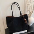 Minimalist black tote bag with matte texture, brown interior and tassel charm detail - Black with Pendant