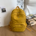 Zaino in nylon giallo brillante con scomparti capienti e pratiche tasche laterali esterne - Giallo