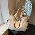 Large beige tote bag with woven handles and drawstring side pockets for daily commute - Off-white