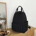 Black minimalist nylon backpack for students featuring dual top handles and large capacity - Black without Pendant