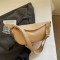 Beige woven crescent shoulder bag with leather strap in a minimalist lifestyle setting - No Pendant / Khaki
