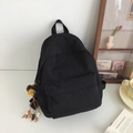 Grande zaino nero in nylon dallo stile minimalista con ciondolo decorativo in nappe - Con Ciondolo / Nero