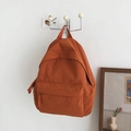 Minimalist large-capacity backpack in burnt orange finish with sleek front zip pocket - No Pendant / Orange