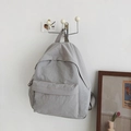 Minimalist light grey nylon backpack for women with front zipper pocket and sleek design - No Pendant / Gray