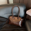 Dark brown patent leather tote bag with gold buckle strap and sleek retro finish - Small / Brown