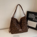 Fashionable large leopard print tote bag with brown leather straps for daily commute - Brown