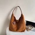 Brown suede hobo tote bag for women with wide shoulder strap and small charm pouch - Brown
