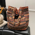 Ethnic geometric lamb wool tote bag with orange and grey patterns and leather label - Brown