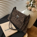 Retro leopard print crossbody bag with metal chain strap and twist lock closure - Brown