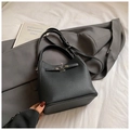 Elegant black lychee grain leather bucket bag with metallic lock and adjustable strap - Black without Pendant