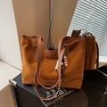 Brown suede tote bag with leather straps and ethnic bead tassel charm in warm light - Brown with Pendant