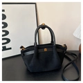 Close-up of black frosted crossbody bag featuring gold metal buckle and leather handle - Black