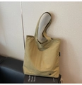Detailed side view of khaki waterproof tote bag with reinforced stitching and metal buckle - Army Green