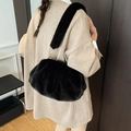 Furry black cloud bag with plush shoulder strap and gold hardware clasp for women - Black