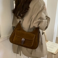 Deep brown suede half-moon shoulder bag with decorative metal buckle and outer flap pocket - Brown