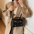 Classic black lychee pattern leather satchel with gold hardware and top handle - Black