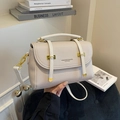 Chic off-white satchel bag with lychee grain texture and gold hardware detail - Off White
