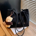 Black hollow-out tote bag with teddy bear pendant on wooden background - Black with Pendant
