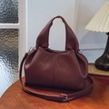 Borsa a secchiello in pelle bordeaux scuro con manico e tracolla regolabile - Borgogna