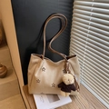 Chic beige tote bag with cutout floral pattern and brown straps with a cute teddy bear charm - Khaki with Pendant