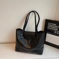 Minimalist black tote bag with flap buckle and matte leather finish for daily commuting - Black without Pendant