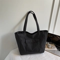Minimalist black and white checkered nylon tote bag with front flap pocket - Black