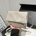 Light gray faux suede minimalist crossbody bag with gold zipper and adjustable strap - Gray