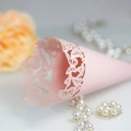 Pale pink laser-cut paper wedding cone with intricate butterfly lace design and pearl finish - Pink