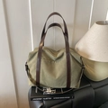 Borsa tote in tela verde oliva con manici in pelle marrone e tracolla regolabile - Verde