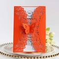 Elegant laser-cut orange wedding invitation featuring a 3D butterfly on a decorative plate - Orange Red