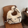 Plush cream heart-shaped shoulder bag featuring brown bows and butterfly metal buckle - Off-white