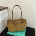 Retro suède draagtas in mosterdgeel met bruine leren handvaten en gespdetail - Khaki