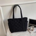 Chic black quilted tote bag with large diamond lattice pattern for daily commuting - Black