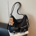 Versatile black commuter tote bag with multi-pocket design and plush puppy charm - With Charm / Black