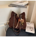 Detail of dark brown suede tote bag with chain strap and cute bear charm pendant - Coffee with Pendant