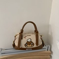 Boston tas van beige canvas met bruine lederen bies en puppy borduursel - Bruin Zonder Hanger