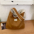 Brown suede tote bag with white faux shearling lining and embroidered label - Brown