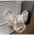 Detail of quilted cloud bag featuring cartoon animal prints and ruffled shoulder strap - Bunny Pattern