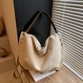 Grand sac hobo en toile beige avec anses en cuir marron et bandoulière réglable pratique - Beige