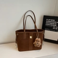 Dark brown suede tote bag with golden buckle and a cute plush dog pendant charm - With Charm / Brown