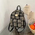 Classic black and white plaid tweed backpack with gold hardware and faux leather straps - Black
