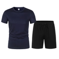 Flat lay detail of dark blue mesh T-shirt and black drawstring athletic shorts set - S / Top And Bottom / Navy/Black