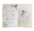 Detail of laser-cut lace wedding invitation with floral insert cards in cream white - Ivory