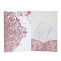 Close-up of rose gold glitter laser-cut lace wedding invitation with floral insert card - Pink